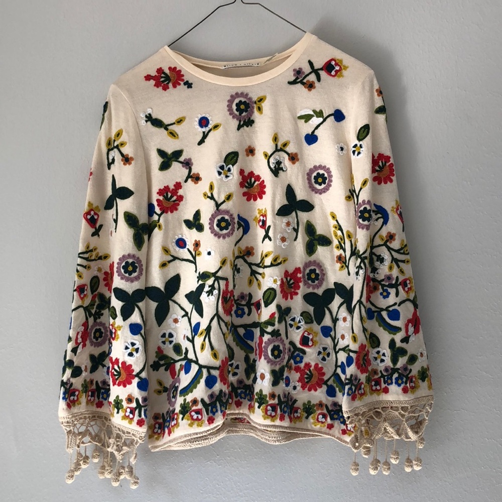Alice + Olivia: embroidered bell sleeve sweater.